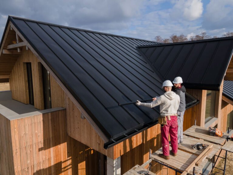 roofing contractors measuring pitch